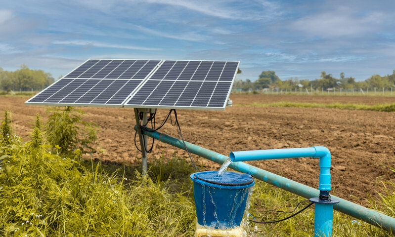 Water pumps and solar panels in farm